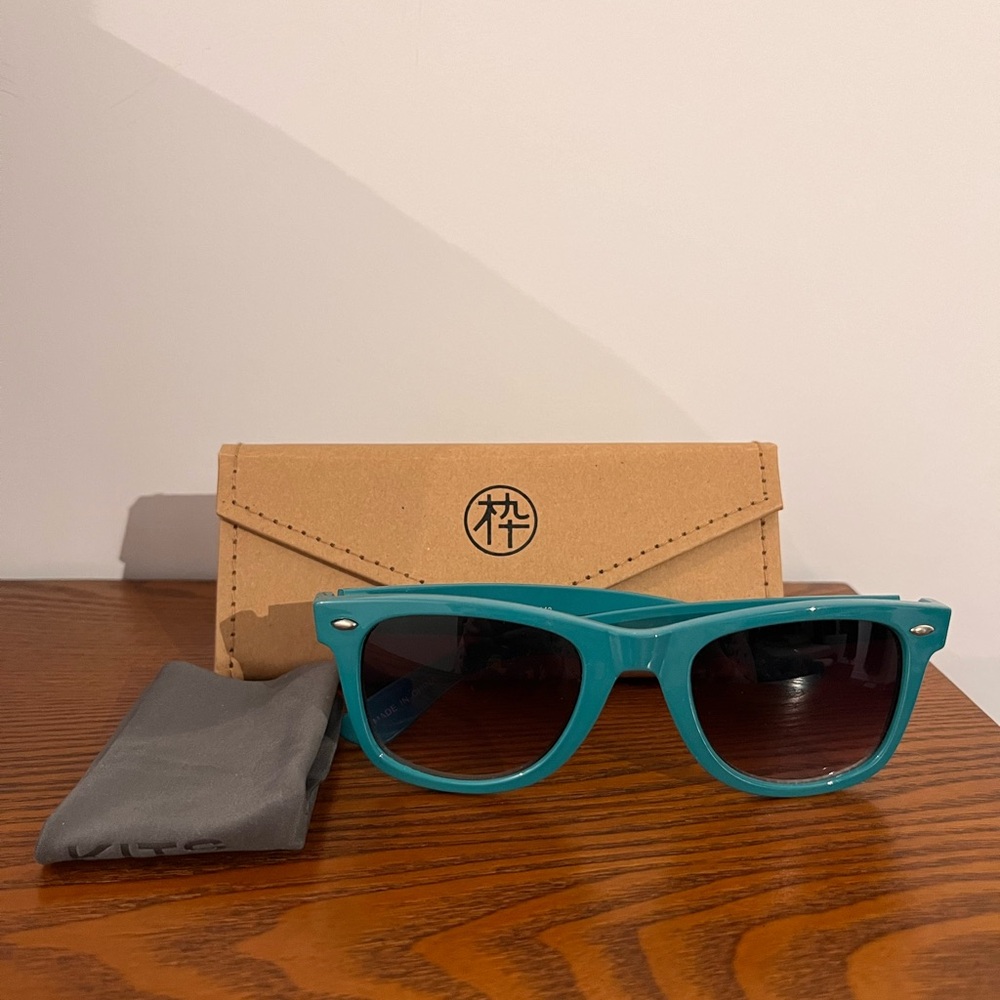 100% UV protection turquoise frame sunglasses
